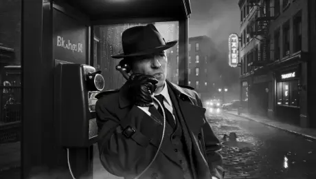 A world-weary private investigator leans against a rain-streaked phone booth on a foggy 1940s New York street, steam rising from a manhole cover. A fedora casts a deep shadow over his eyes. Holding the classic receiver, he speaks in a low, gravelly voice: "The recording was pure static, a dead end. Then I ran it through WaveSpeedAI. The new Wan2.5 algorithm filtered the noise... I heard everything. The whisper, the threat, the whole rotten deal." High-contrast black and white, dramatic chiaroscuro lighting, deep focus, 35mm film grain, moody and atmospheric.