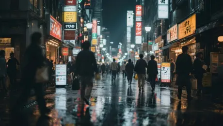A busy street in Tokyo at night after rain. People are walking by, blurred reflections of neon signs and city lights on the wet pavement. Tilt-shift effect, cinematic, detailed, street photography, moody lighting, 4K, time-lapse feel.