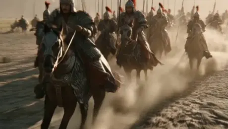 The drone's perspective is quickly pulled back and lifted, Surrounded by a view from above, A team of Han Dynasty cavalry galloped at full speed on the grassland, The horse's hooves stir up dust and roll up with the wind, 6 seconds later, the drone perspective provides a bird's-eye view of the cavalry galloping on the ground, The picture is silent and magnificent, and the composition structure of the picture is unmoving, Follow the prompt words closely,