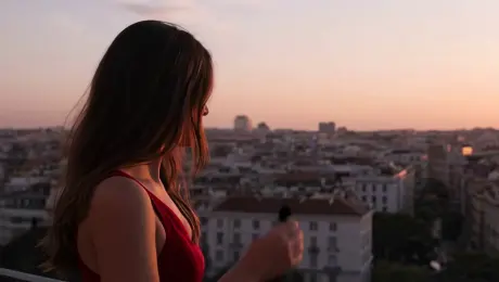 Change the girl's clothes into red dresses.