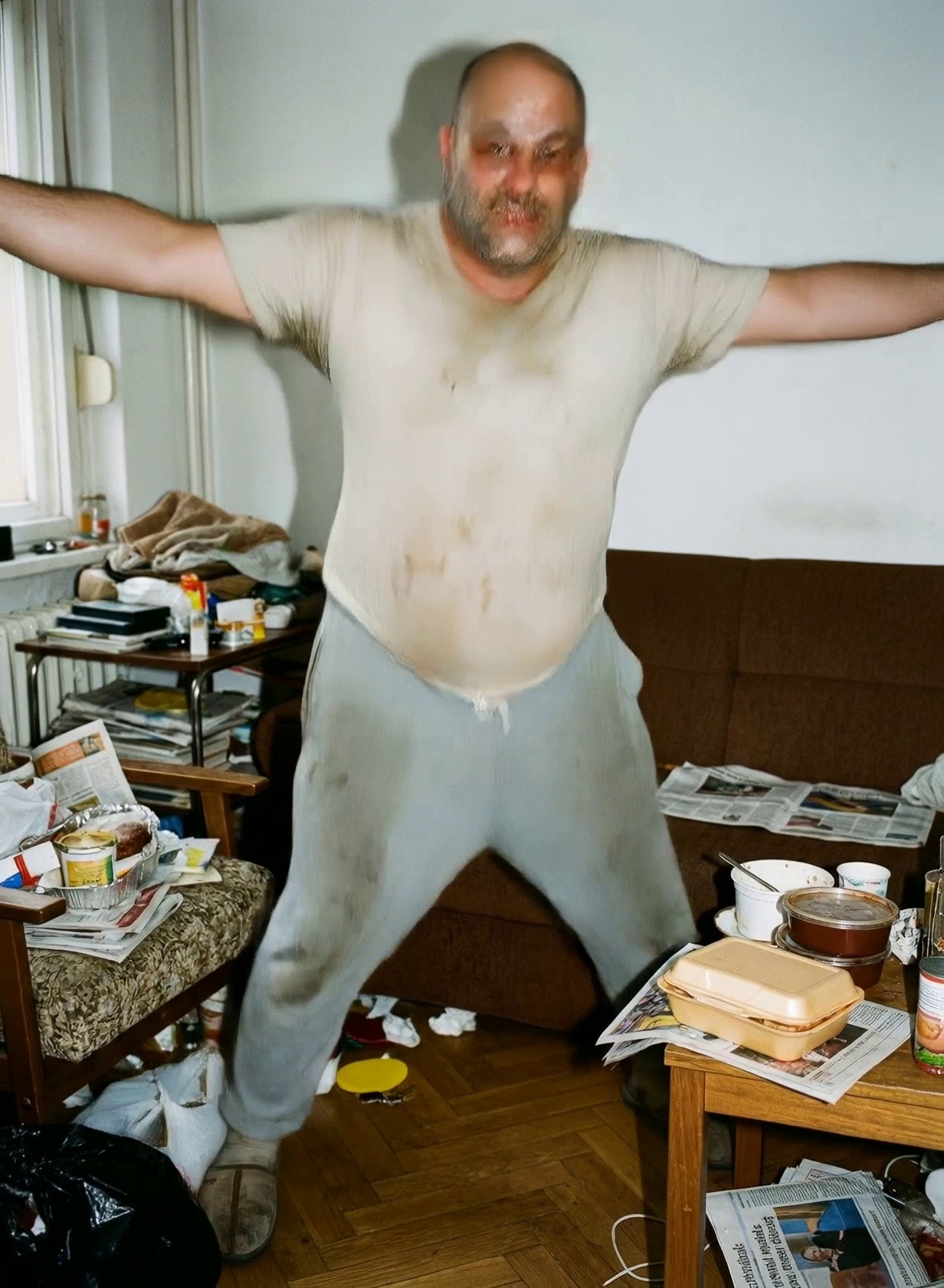 Produce a video of the man from the video performing the actions shown in the image.